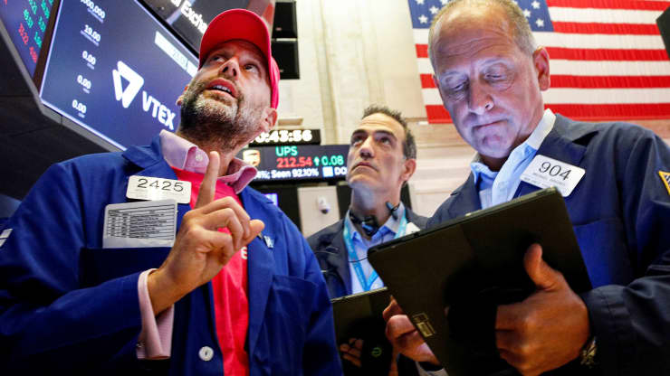 Traders work on the floor of the New York Stock Exchange (NYSE), July 21, 2021.