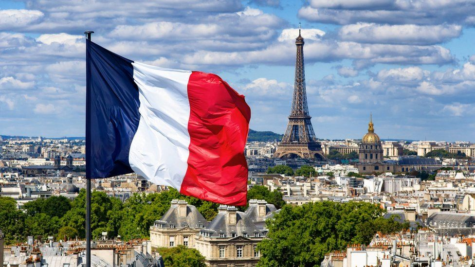 Why has France has changed the blue on its flag? - BBC Newsround