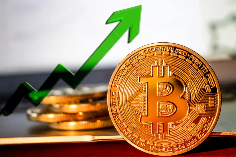 Giá Bitcoin bật tăng qua mốc 21.000 USD